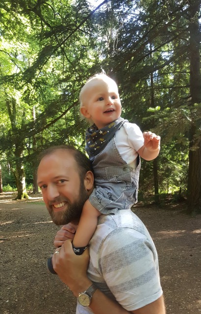 Dad with son on his shoulders